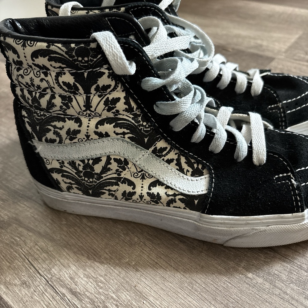Vans Women's Black and White High-Top Sneakers